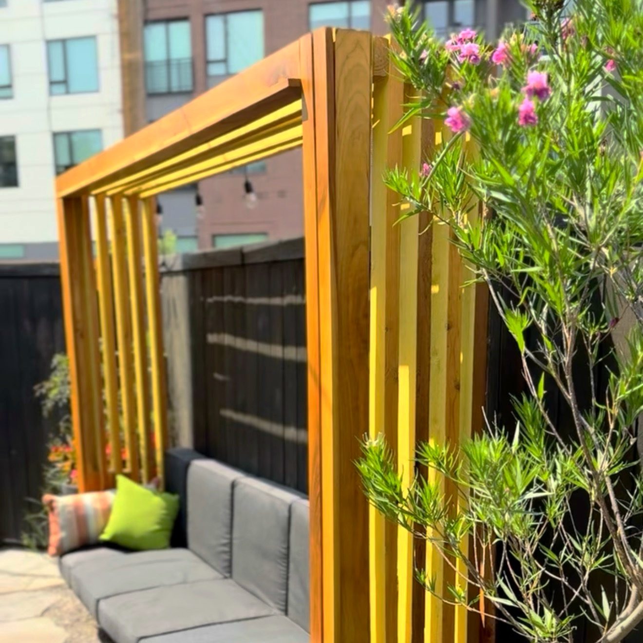 Custom cedar pergola and outdoor living space built by Stonegate Gardens in Denver